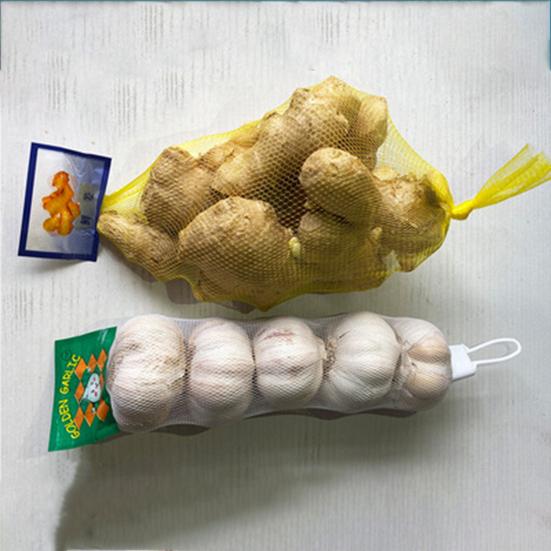 100 stk Nettingposer Praktiske Gjenbrukbare PE Pustende Hvitløk Ingefær Pakkenett Sekker Plastspenner for Marked