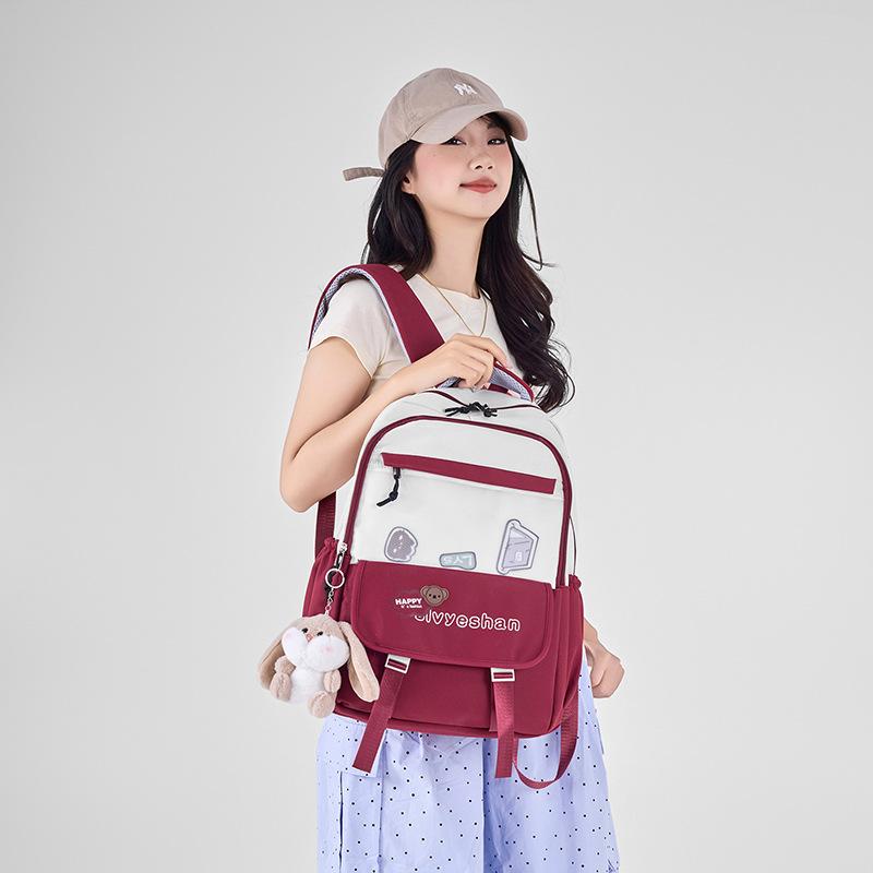 School bag new lightweight simple casual versatile junior high school students backpack men and women go out backpack computer bag