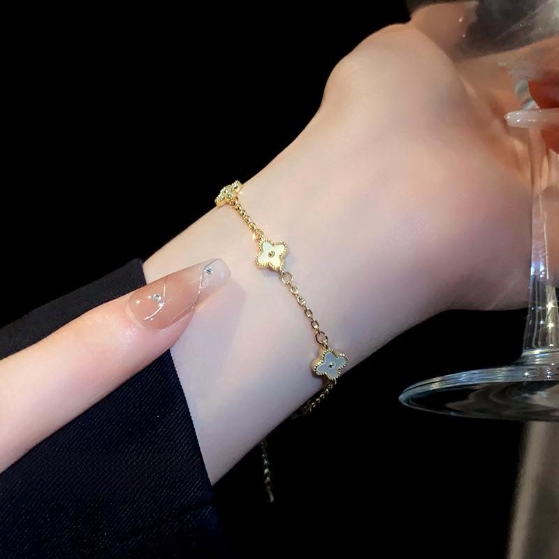 Gold Electroplated Four-Petal Flower Bracelet - Light Luxury, Sweet, High-End Hand Jewelry for Women