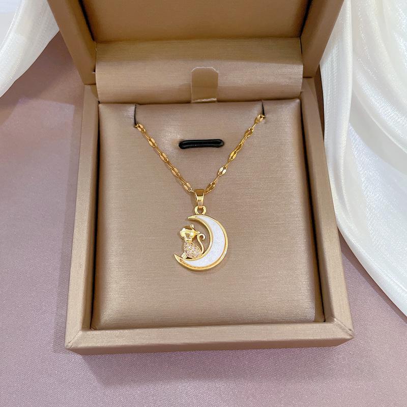 Titanium Steel Moon Pendant Necklace: Elegant Full Diamond Micro-Pave Design, Sparkling and Stylish for Women.