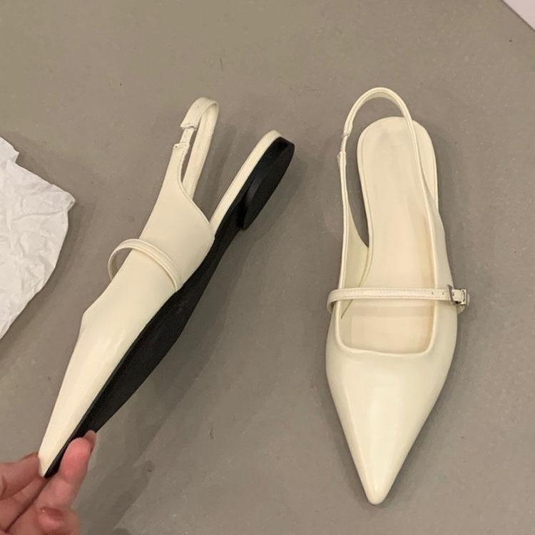 Flat-bottomed bag head sandals women's 2025 new spring and summer new pointed niche design sense one word with empty single shoes