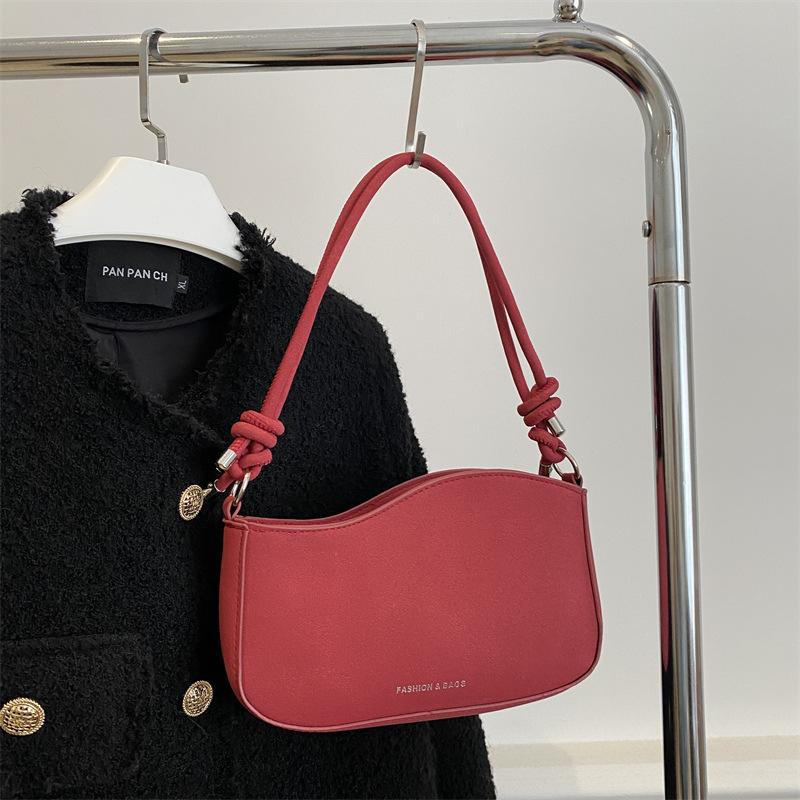 

2025 winter new simple retro versatile streamlined underarm saddle bag niche design fashionable shoulder messenger bag червоний
