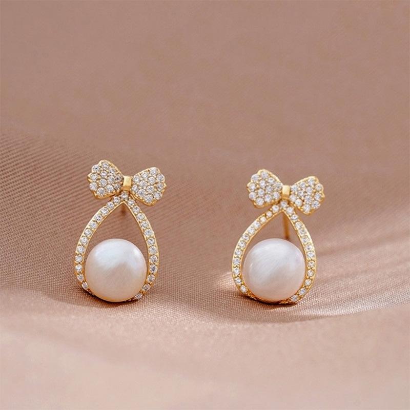 

Французский Элегантный Микро Набор Циркон Бантик Жемчужная Подвеска Серьги 2024 Новый Дизайн Циркон для Женщин Девушек Модные Ушные Аксессуары