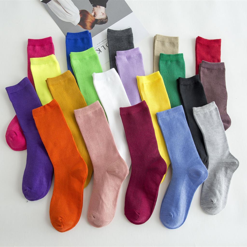 Chaussettes à Tube moyen de couleur unie pour femmes, antidérapantes, absorbant la sueur, bas légers résistants à l'usure
