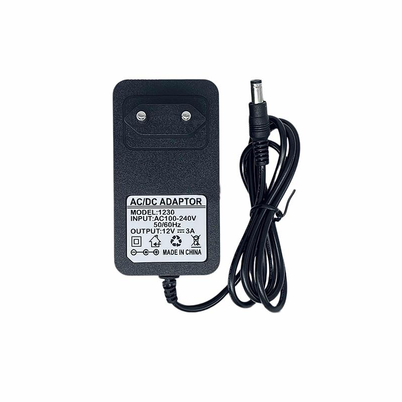 Adattatore Alimentatore Caricabatterie 2.4V2A Nero Per Lampada LED UV Sicuro e Durevole VDE Asciugacapelli per Unghie Strumenti per Nail Art