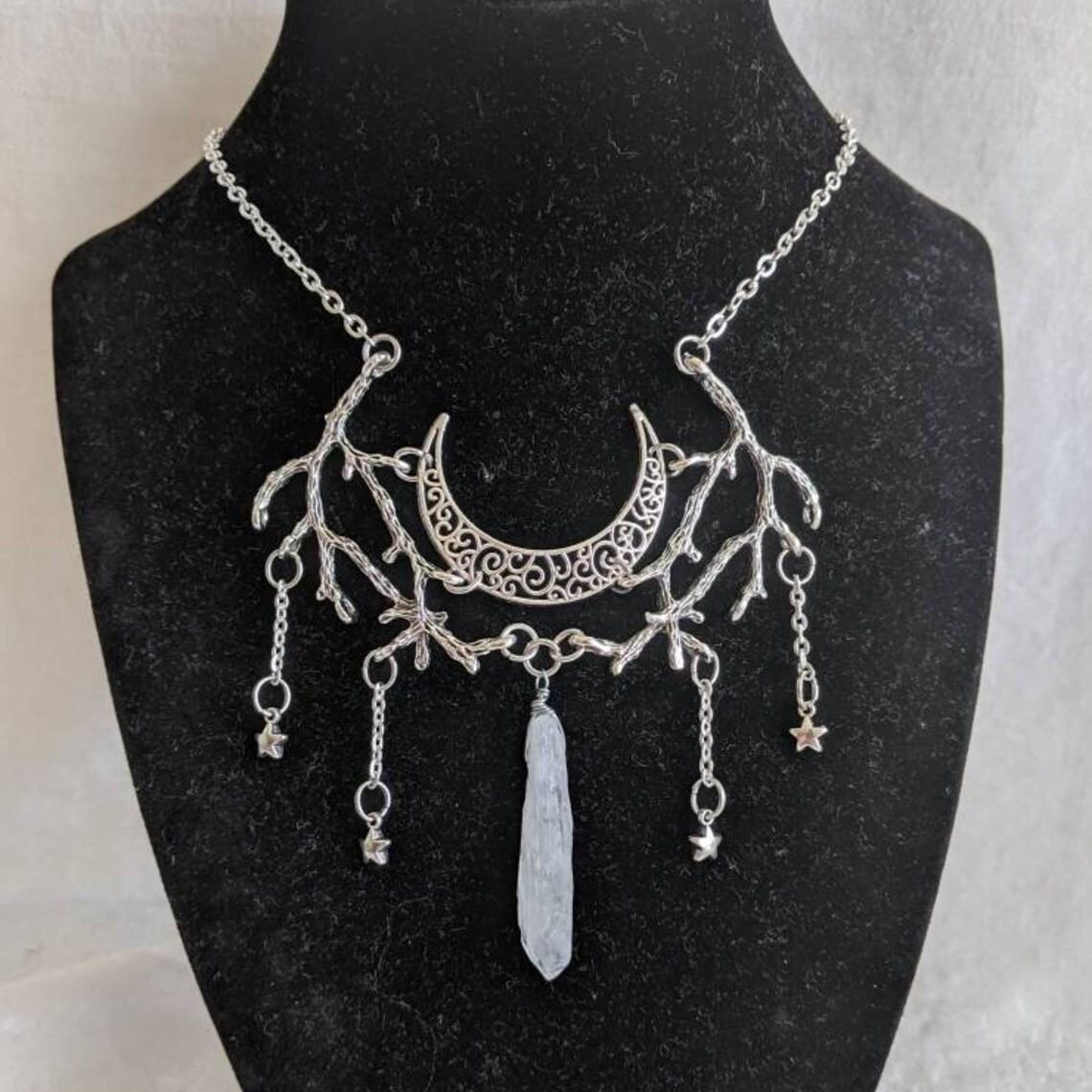 

Bohemia Temperament Sliver Color Hollowed-out Moon Stars Tassel Irregular Crystal Pendant Necklace for Women Magic Witch Jewelry
