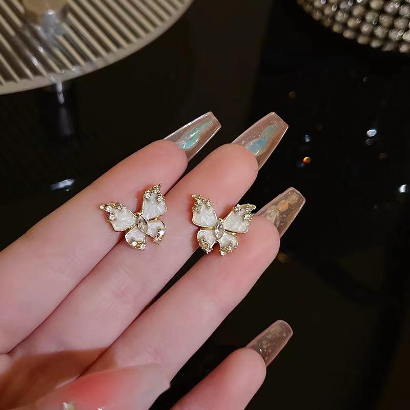 Sterling Silver Butterfly Stud Earrings with Mother-of-Pearl - Elegant and Unique Design