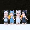 Dumb and Cute Fish-Holding Doll: Trendy Desktop or Car Ornament in Cute Dungarees