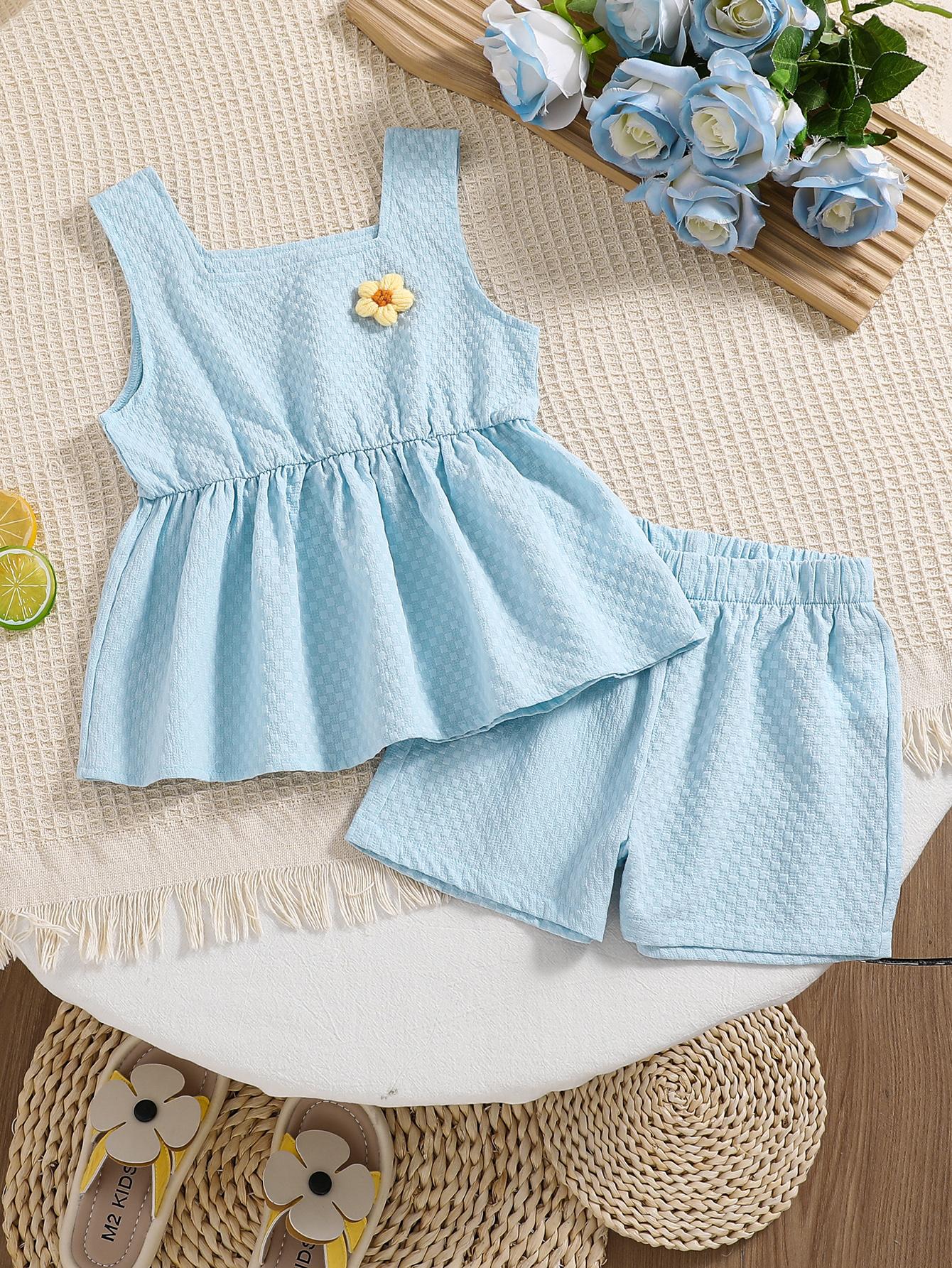 2-piece set for girls: solid color, versatile plaid vest and skirt with yellow floral accents, paired with athletic shorts. Summer outfit. 4Y синий
