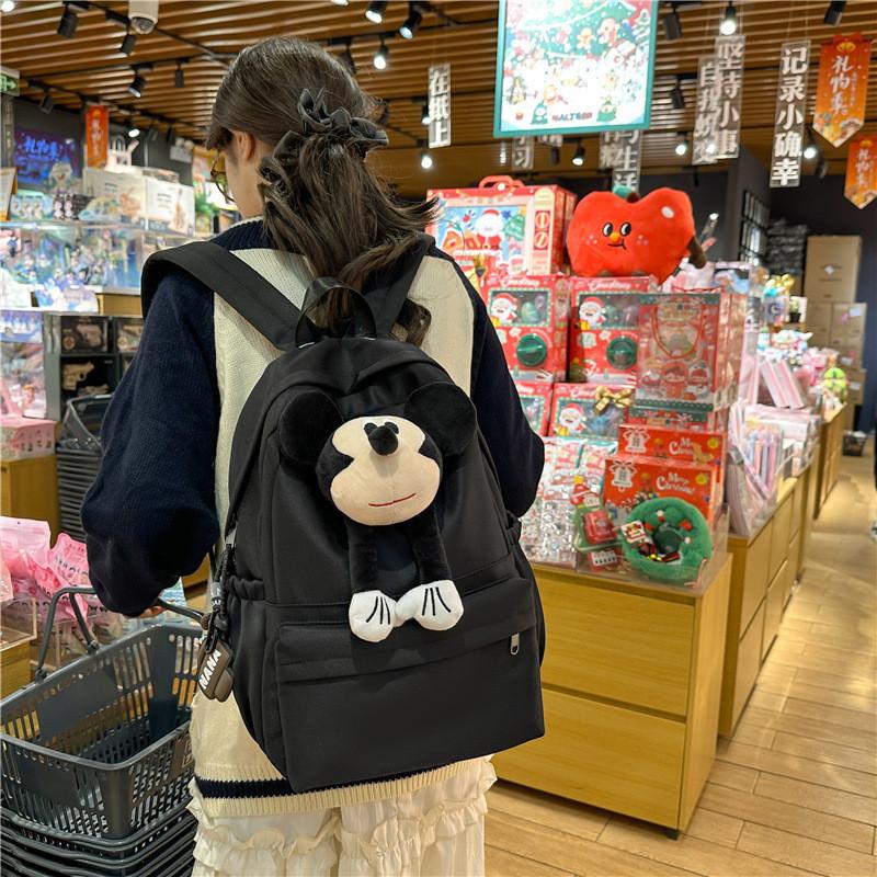 Trendy Nylon Unisex Backpack For Students With Spacious Design And Chic Aesthetic