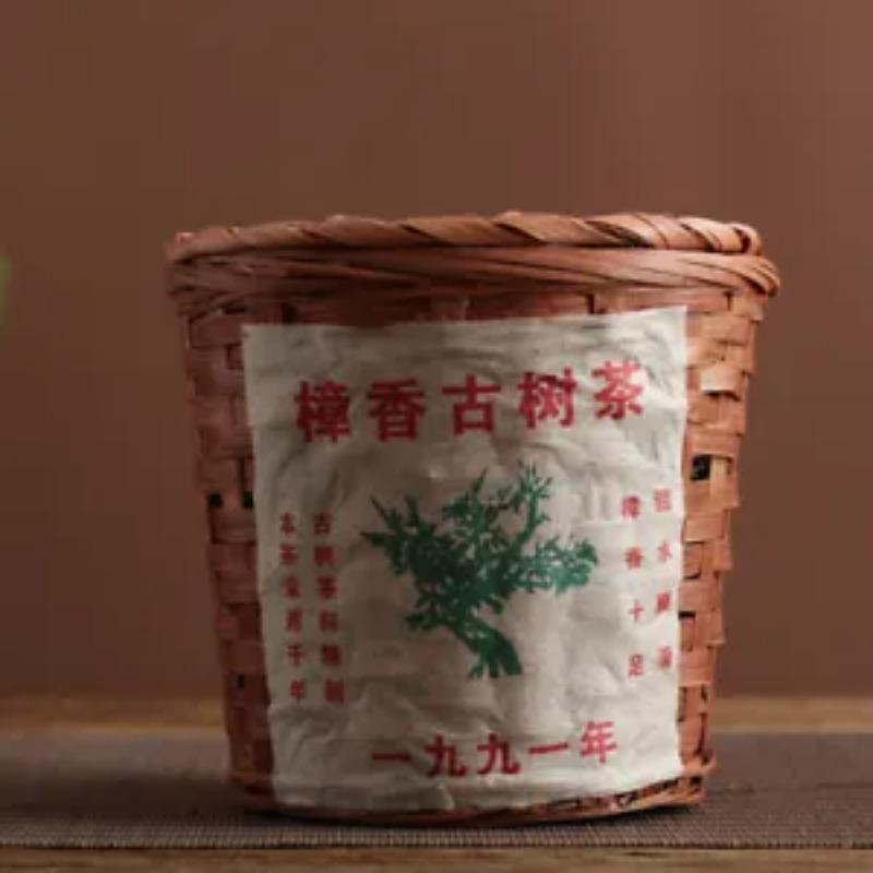 Yunnan Puer Tee Zhang Xiang Uralter Baum Puerh Lose reife Korbpackung 300g
