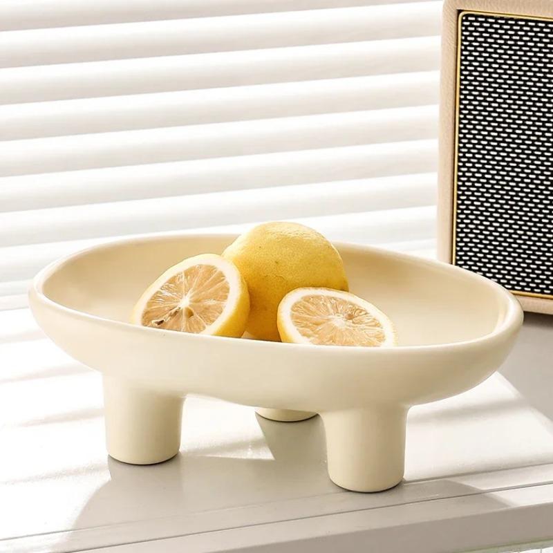 

Cream fruit tray simple and luxurious dining table decoration three legged high legged snack tray storage tray