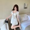 Sexy lapel short-sleeved bow splicing small man covering meat pure desire wind sweet waist big swing dress