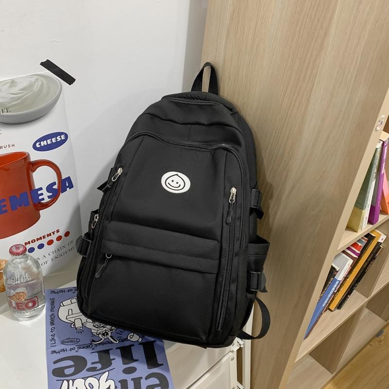 Schoolbag student schoolbag smiley face printing contrasting color large-capacity backpack Korean version Chinese college students commuting 