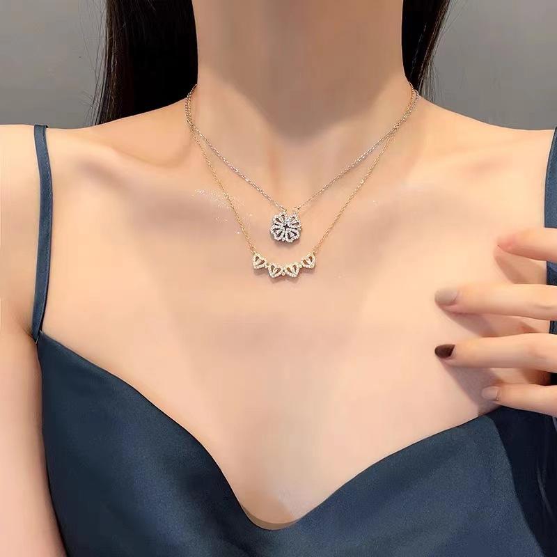 Fashionable women's four-leaf clover necklace with heart shape and full of diamonds; a versatile piece of jewelry that can be wo