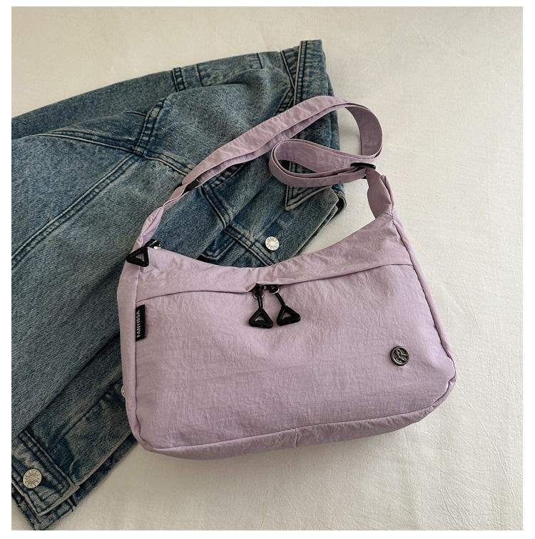 Lightweight going out simple messenger bag multi-functional nylon portable dumpling bag fashionable commuter niche shoulder bag