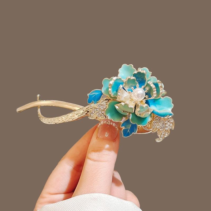 Factory direct fashion flower pearl twist clip elegant hairpin Internet celebrity head spring clip