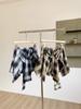 2026 Summer Women's Retro High-Waisted Plaid Skirt with Faux Two-Piece Design