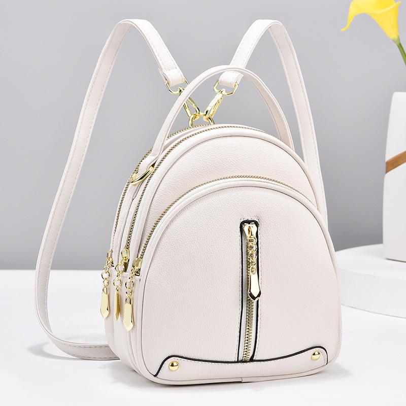 Malá taška Módní korejská verze Trendy Malý batoh Simple Atmosphere Jedno rameno Crossbody Malá kulatá taška Dvojité rameno Dámská taška