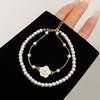 Echtgold-Galvanisierung tropfende Kamelienperle zweiteiliges Set Armband elegantes Armband Nischen-Design Schmuck Damen