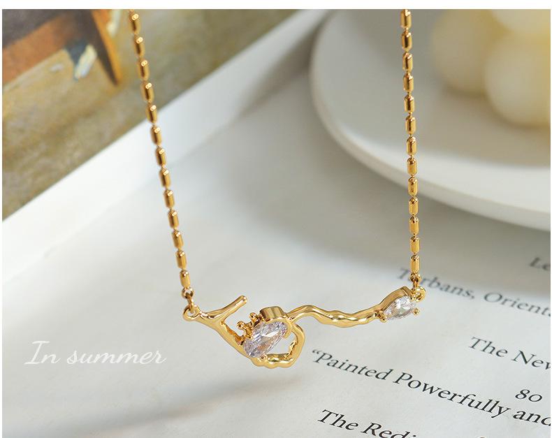Celebrity-Inspired Gold-Plated Titanium Steel Necklace with Zircon Root-Shaped Pendant