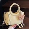 Spring and Summer High-value Small Fresh Cream Wind Portable Bucket Bag Women's Versatile Foreign Style Daily Leisure Commuting Messenger Bag