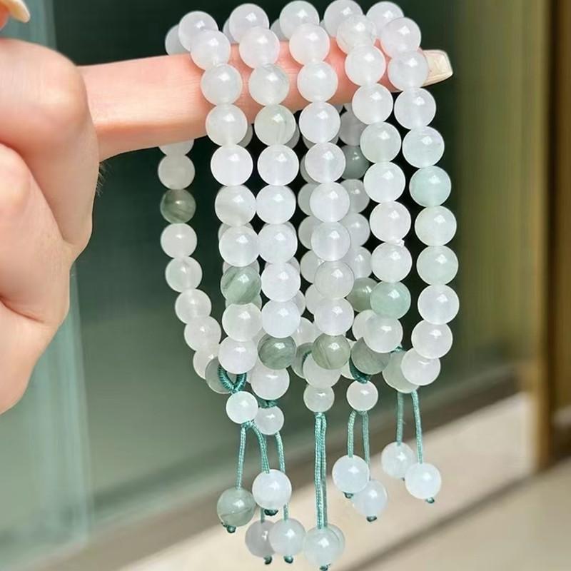 Women's Tianshan Gold Silk Jade Bracelet with White Floating Flower Design