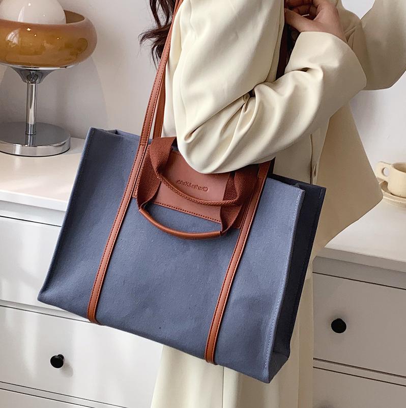 Portable Canvas Large Bag Women's Large Capacity 2025 New High-end Commuting Shoulder Bag Fashion Tote Bag