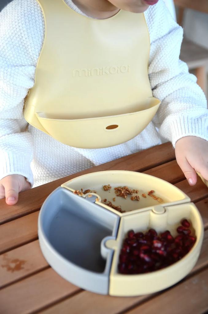 Silicone Bib for Children with Pocket for Dishes Yellow MinikOiOi 1 Pc.