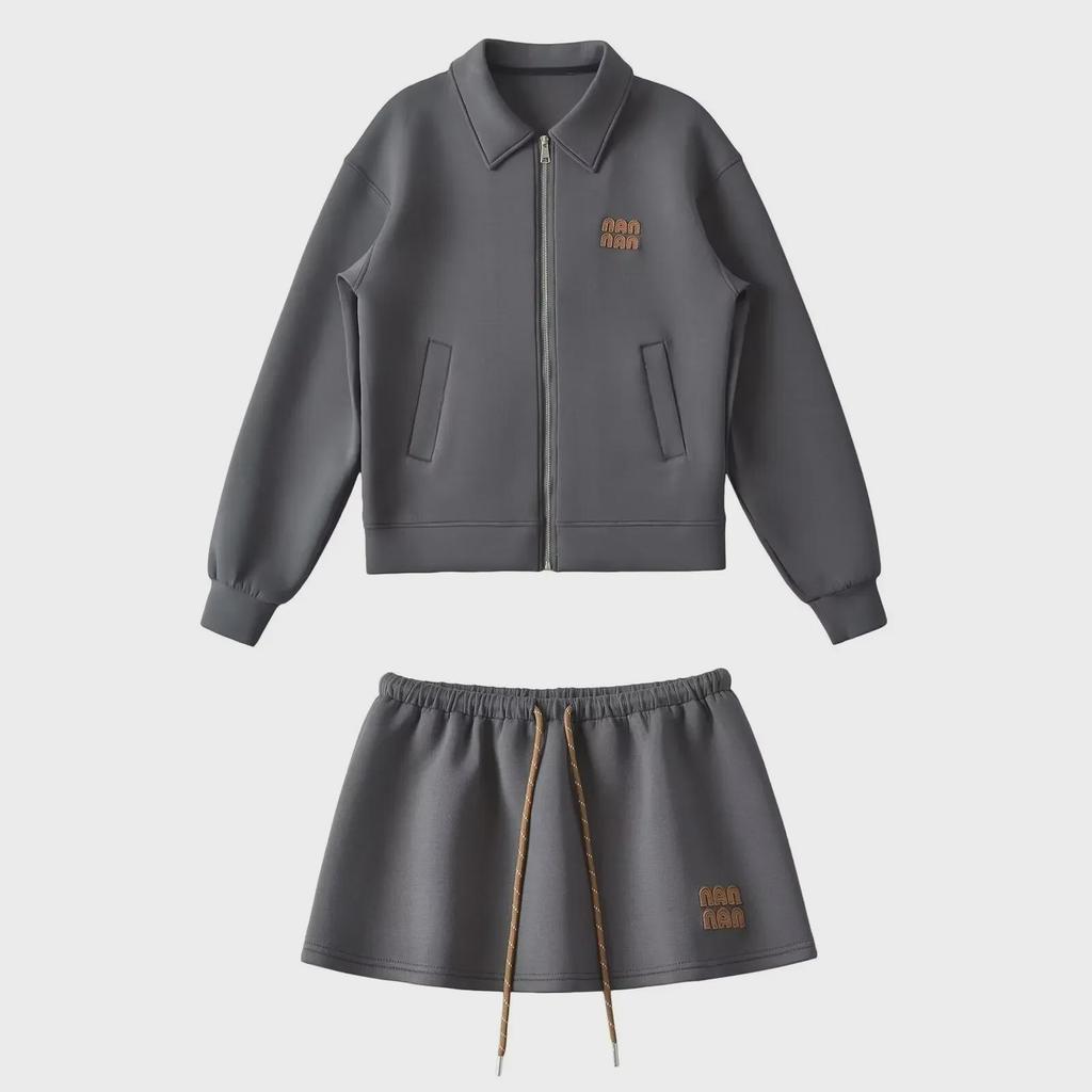 "Sweet Sports Style Mini Skirt: Elastic Waist, Air Layer Embroidery, Anti-Exposure, Versatile Sweater Material for Women."