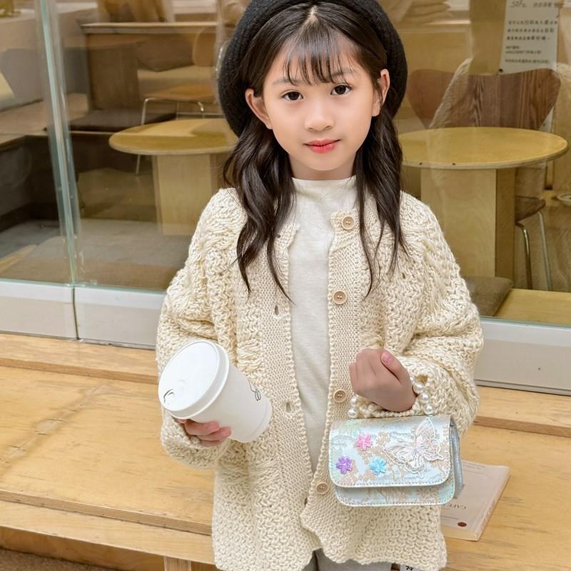 And Versatile Elegant Childrens Handbag With Chic Chain Detail And Charming Scenery Print