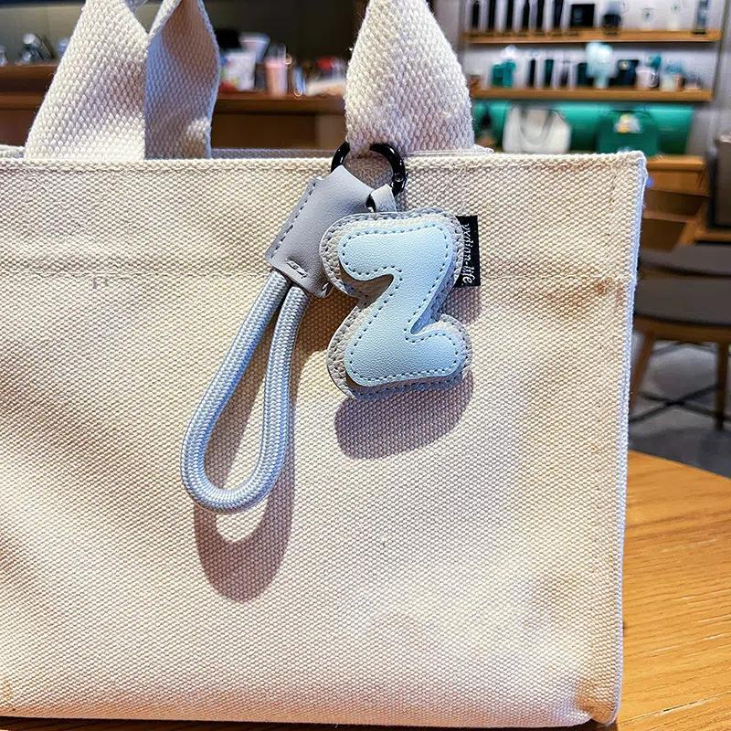 Creative Exquisite 26 English Letter Keychain Pu Leather Bag Hanging Charms Alphabet Keyring Ornaments Lucky Pendant Couple Gift