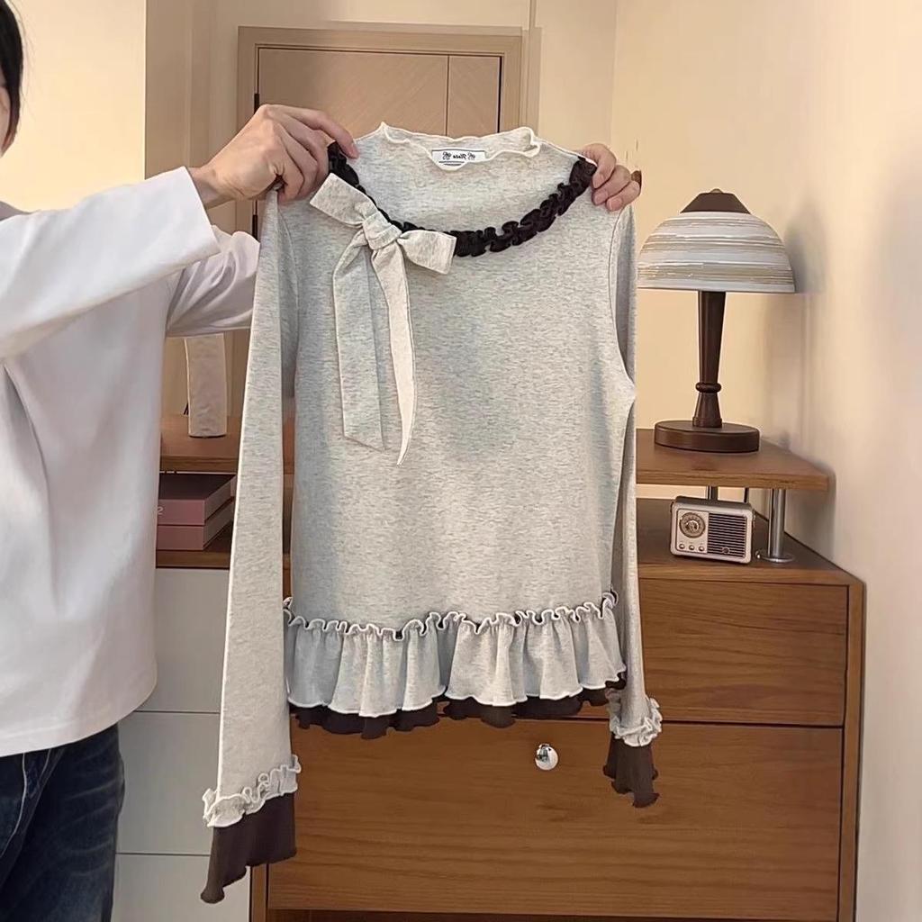 Haut rétro DeRong à col montant pour femme avec ourlet à volants, design effet deux-pièces, manches longues et nœud 3D.