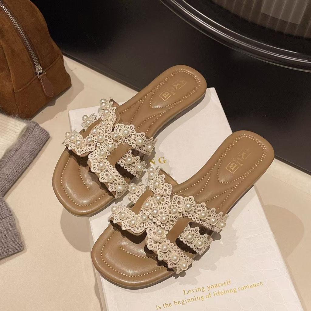 Seaside pearl drag girl summer 2025 outer wear Xiaoxiang flat bottom one-word drag fairy niche is beautiful and cool