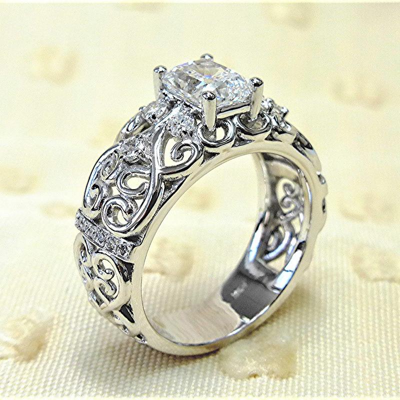 Retro court style jewelry, new pattern hollow flower ring, creative personalized zircon women's ring