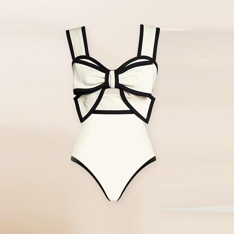 Südostasiatischer Retro-Jumpsuit mit Schleife: Bauchbedeckender, Schlankmachender Badeanzug mit Rock-Stil für den Strand.