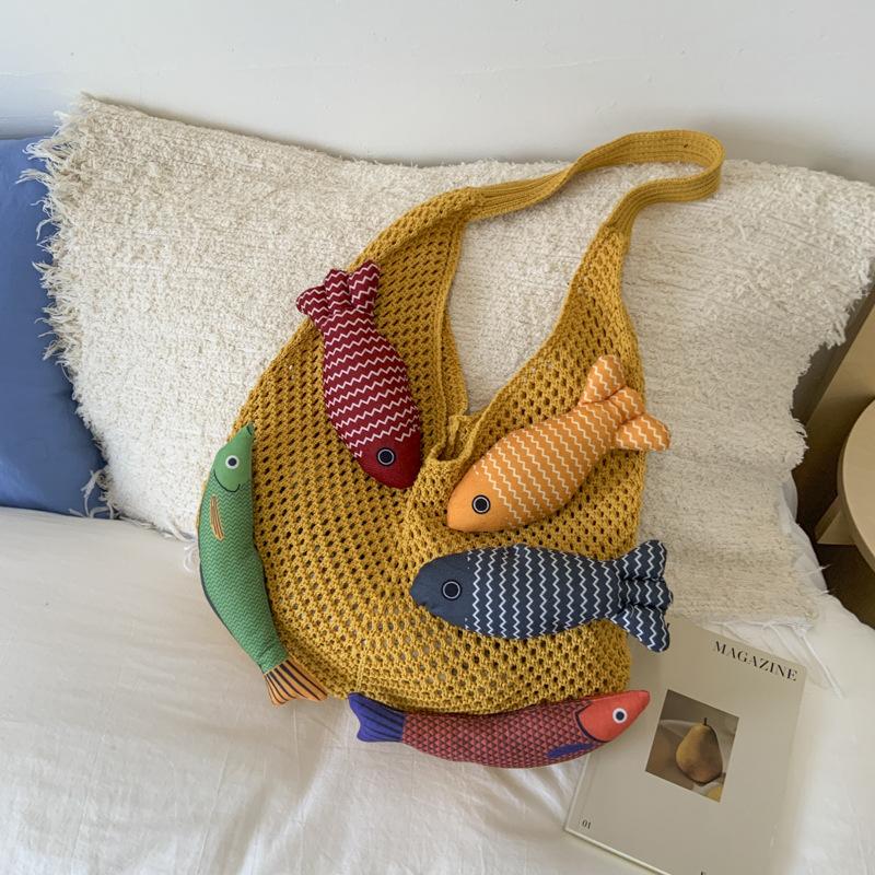 Niche bag women's large-capacity new summer leisure shoulder knitted woven bag commuter tote bag