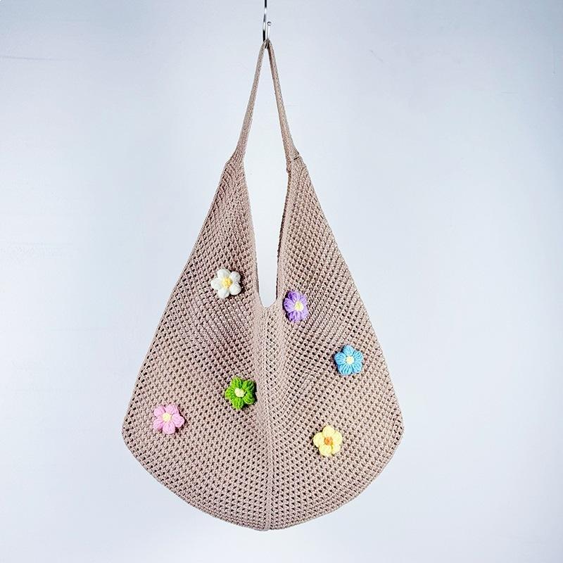 Beach bag single shoulder tote bag women's hollow new Korean version knitted woven bag flower lazy wind