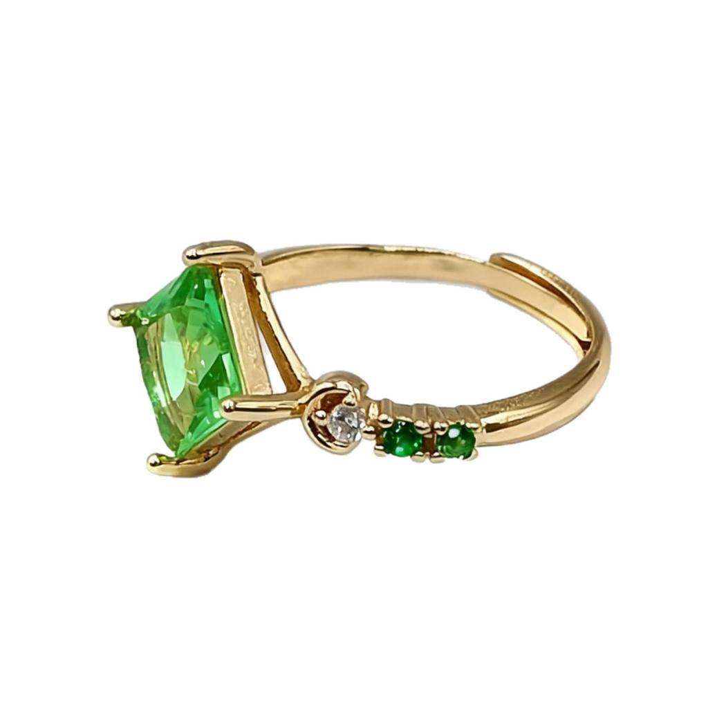 Yintai Fei Elegant Rhombus Facet Zircon Ring: 18k Gold-Plated Copper with Diamond and Green Peridot.