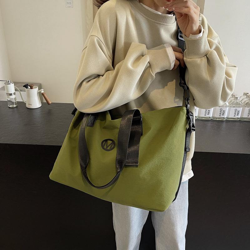 Fashion leisure travel bag, business trip, short trip out, hand bag, daily sports storage, leisure play fitness bag