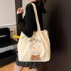 Canvas bag women's large-capacity new versatile shoulder messenger bag casual college student class tote bag