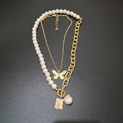 2023 Dwuwarstwowy naszyjnik z perłowym motylkiem