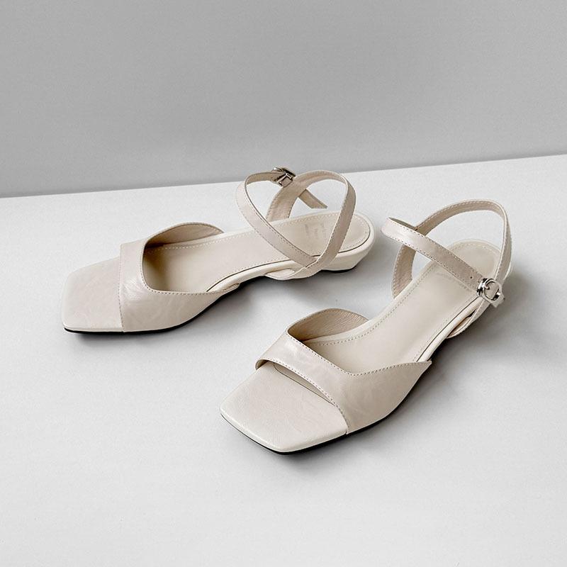 The first layer of sheepskin super soft temperament French sandals women's 2025 small wedge heel commuter middle heel with Roman sandals