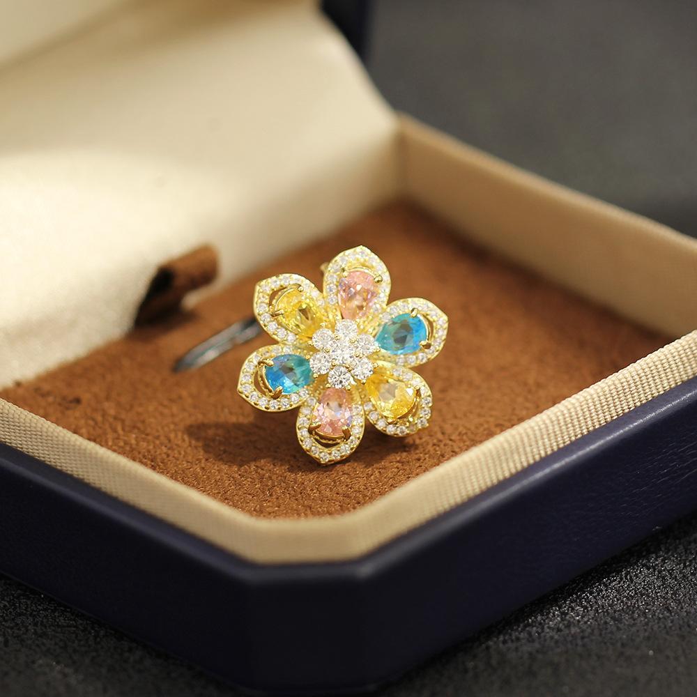 New product exquisite and versatile color zircon inlaid stone flower brooch temperament fashionable and small flower pin collar pin women's model