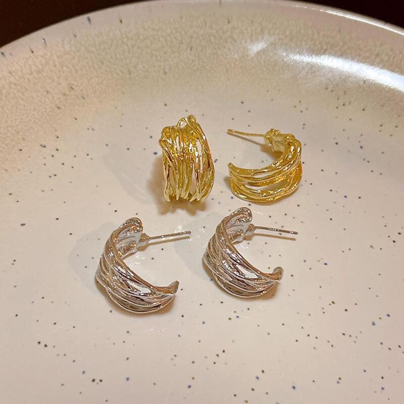 

Thin-strand layered gold and silver simple hoop earrings gold