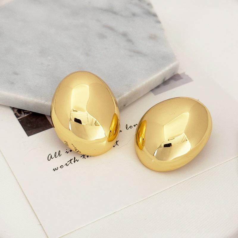 Temperament Cold Wind Smooth Face Women'S Earrings Oval Three-Dimensional Goose Egg Hollow Stud Earrings