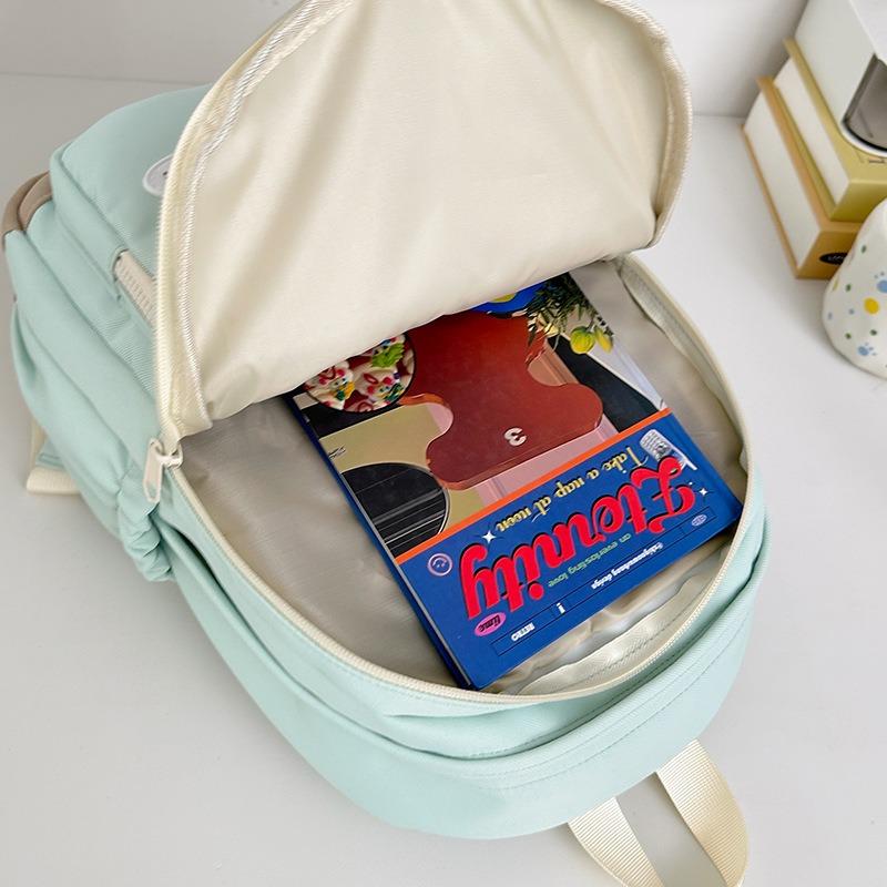 High-value Candy Color, Fresh and Sweet Backpack, Lightweight Make-up Class for Junior High School Students, and Large-capacity Backpack.