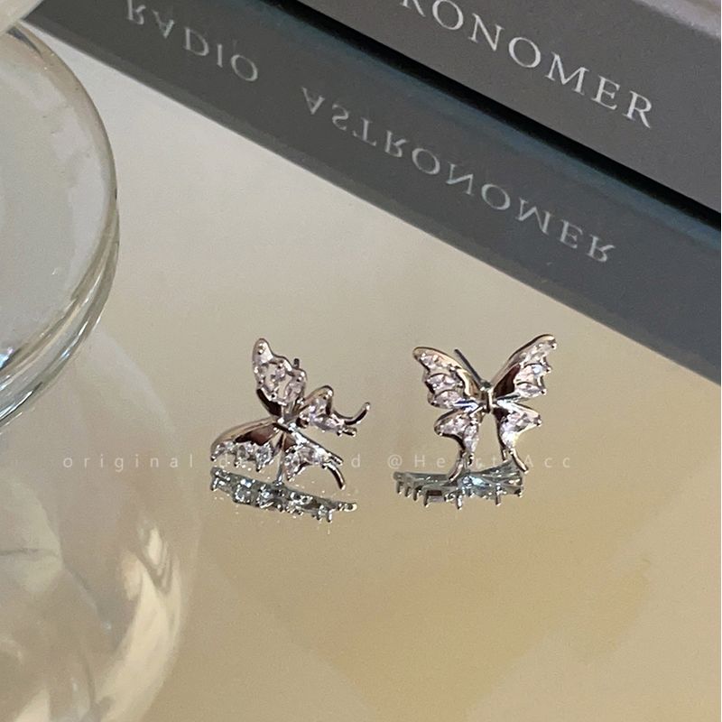 

Cut Out Butterfly Micro-Inlaid Best Selling Internet Celebrity Versatile Zircon Cut Out butterfly zircon earrings (Silver Needle)