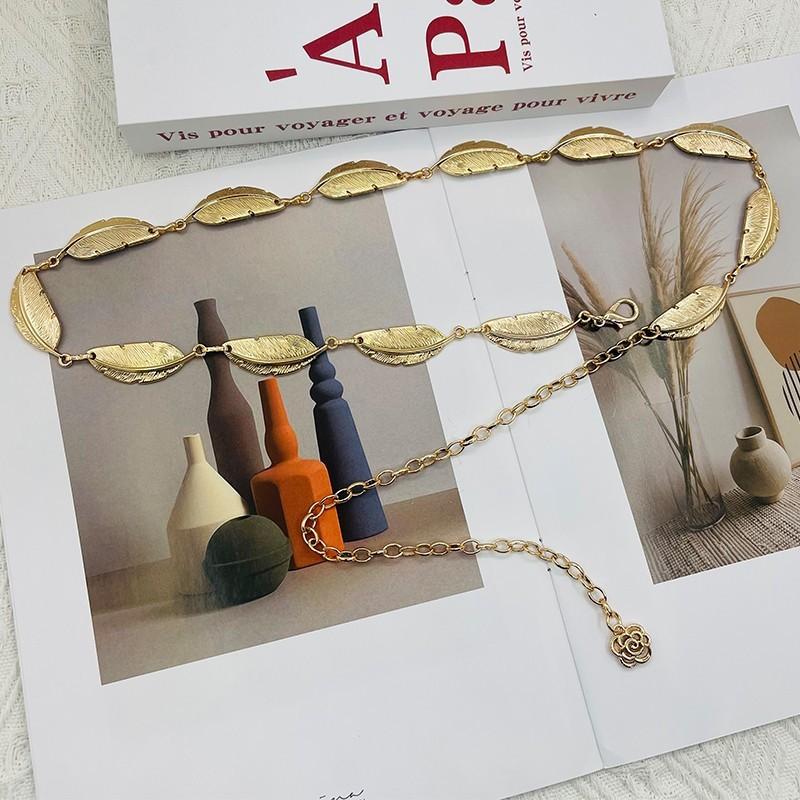 

Fashion Metal Feather Waist Chain For Women With Sparkling Water Diamond Embellishments золотий