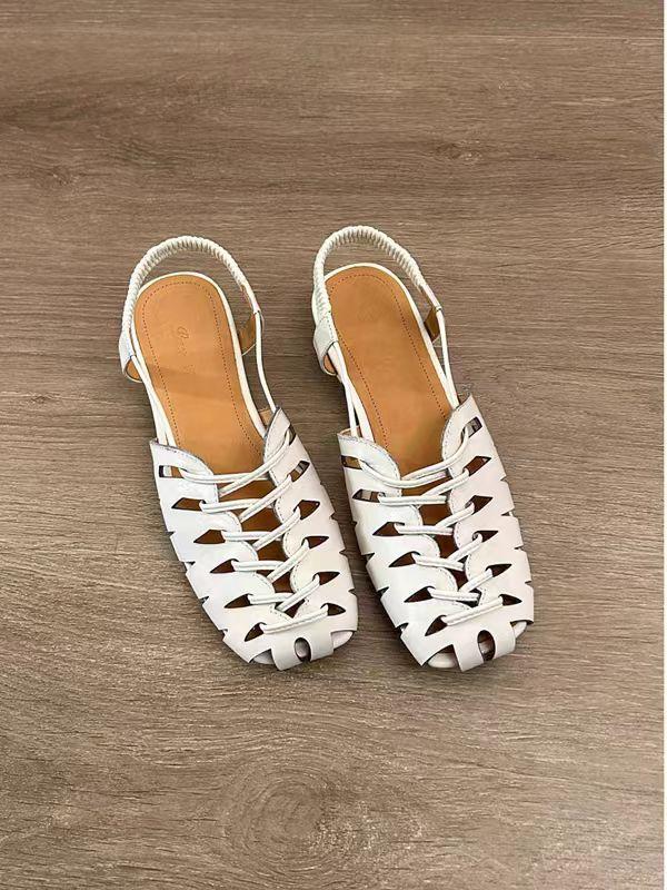Sheepskin version~ French niche hollow breathable soft leather Roman sandals women's summer back strap flat-bottomed bag head pig cage shoes